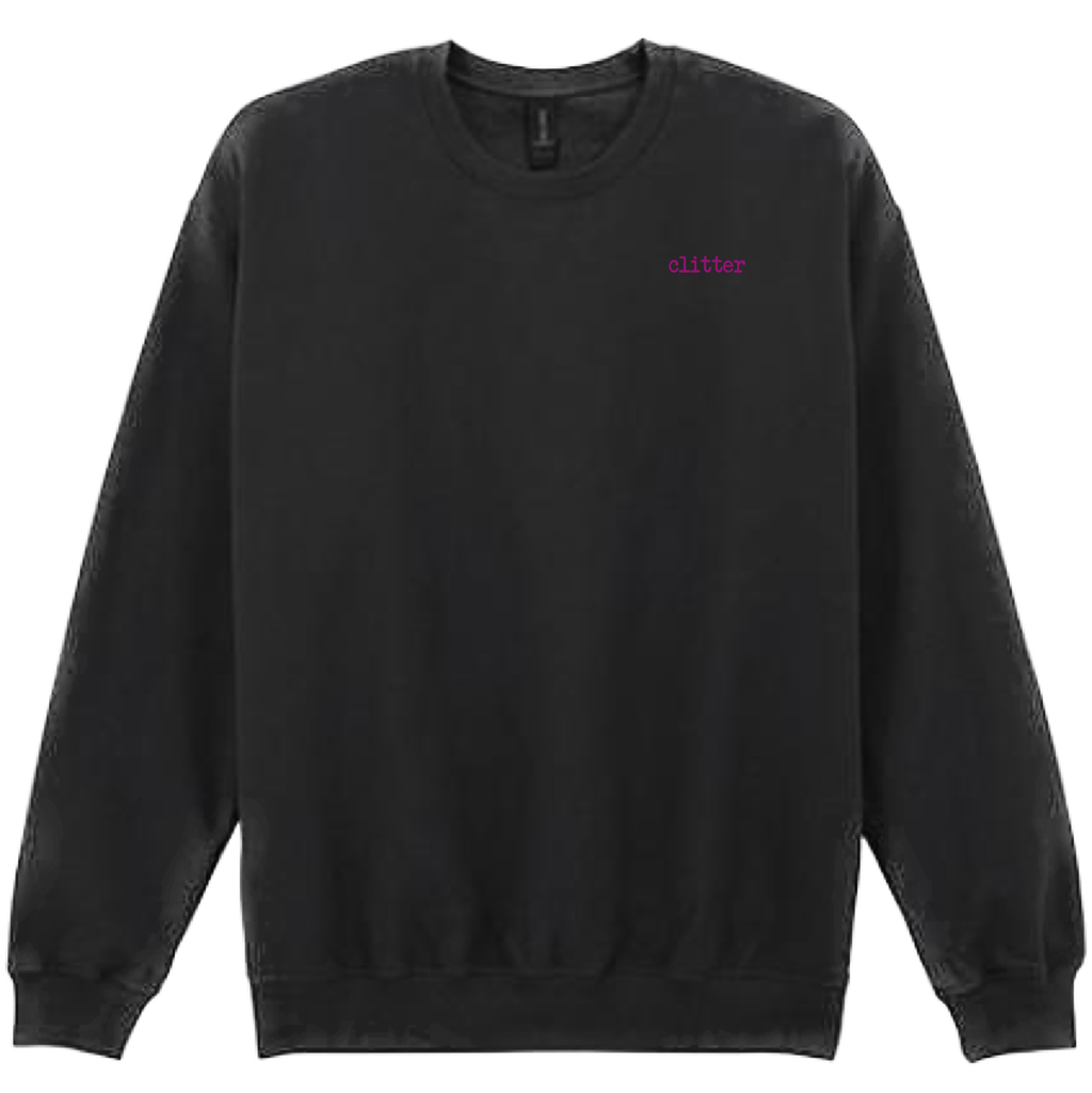 A black crewneck sweatshirt with the word 'glitter' printed in a small pink font on the left chest, displayed against a solid white background.