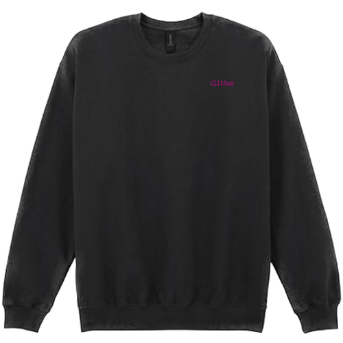 A black crewneck sweatshirt with the word 'glitter' printed in a small pink font on the left chest, displayed against a solid white background.